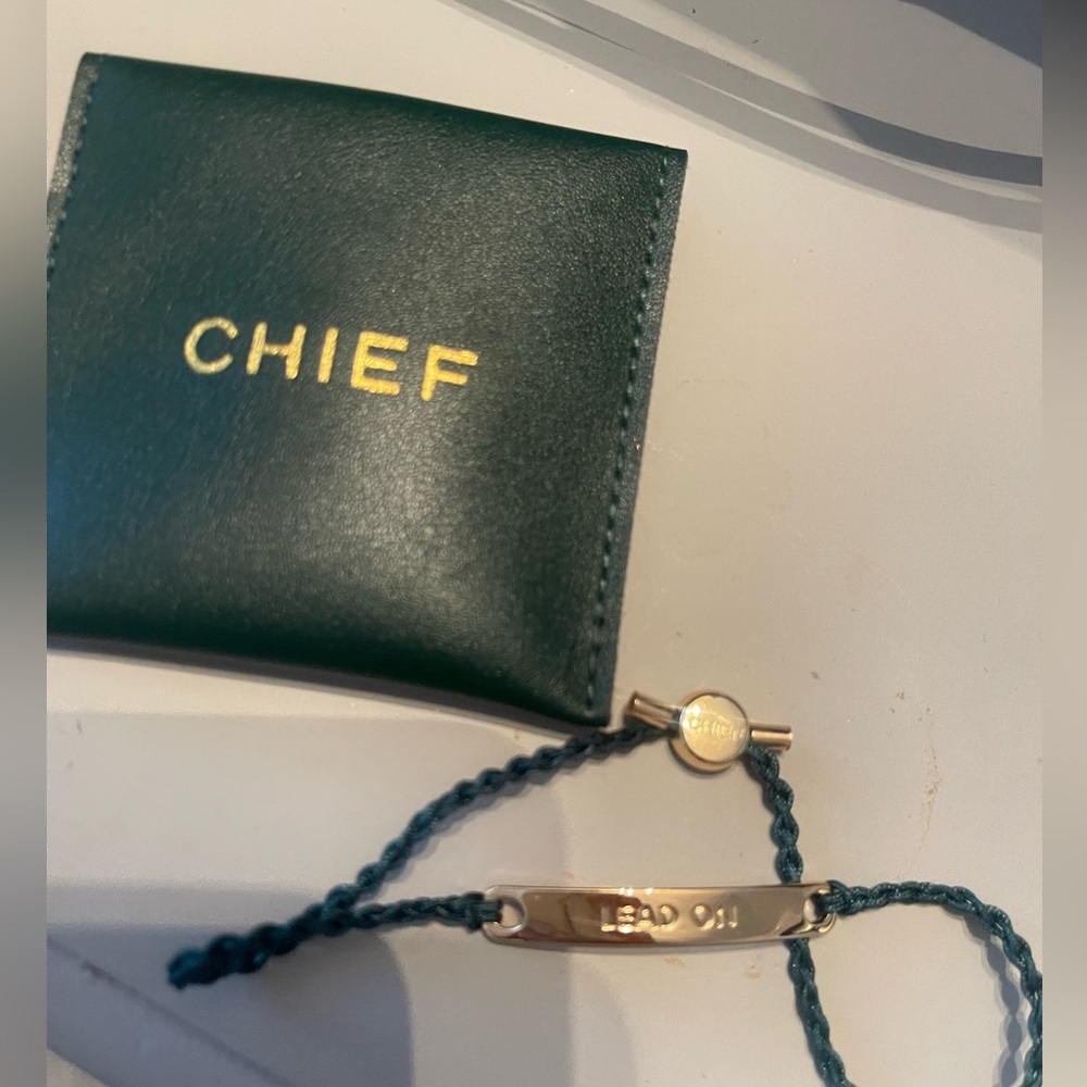LEAD On Gold Bracelet with Green Cord and Pouch, by CHIEF